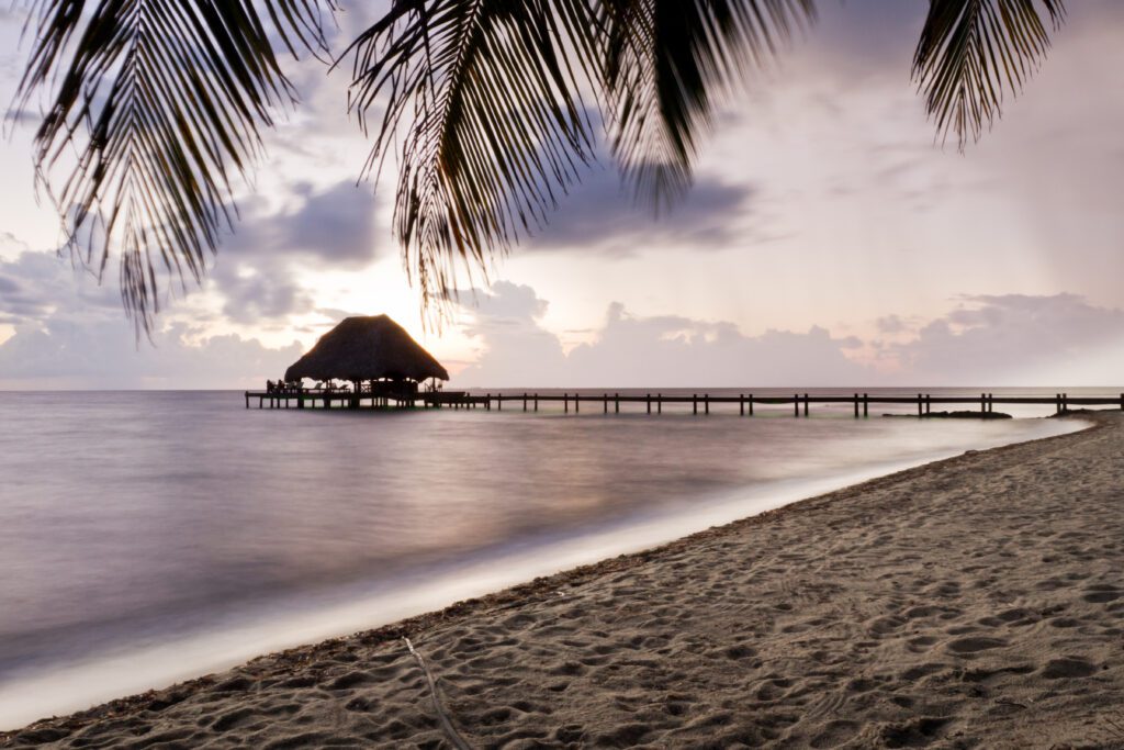 Beautiful tranquil beach sun rise in southern Belize